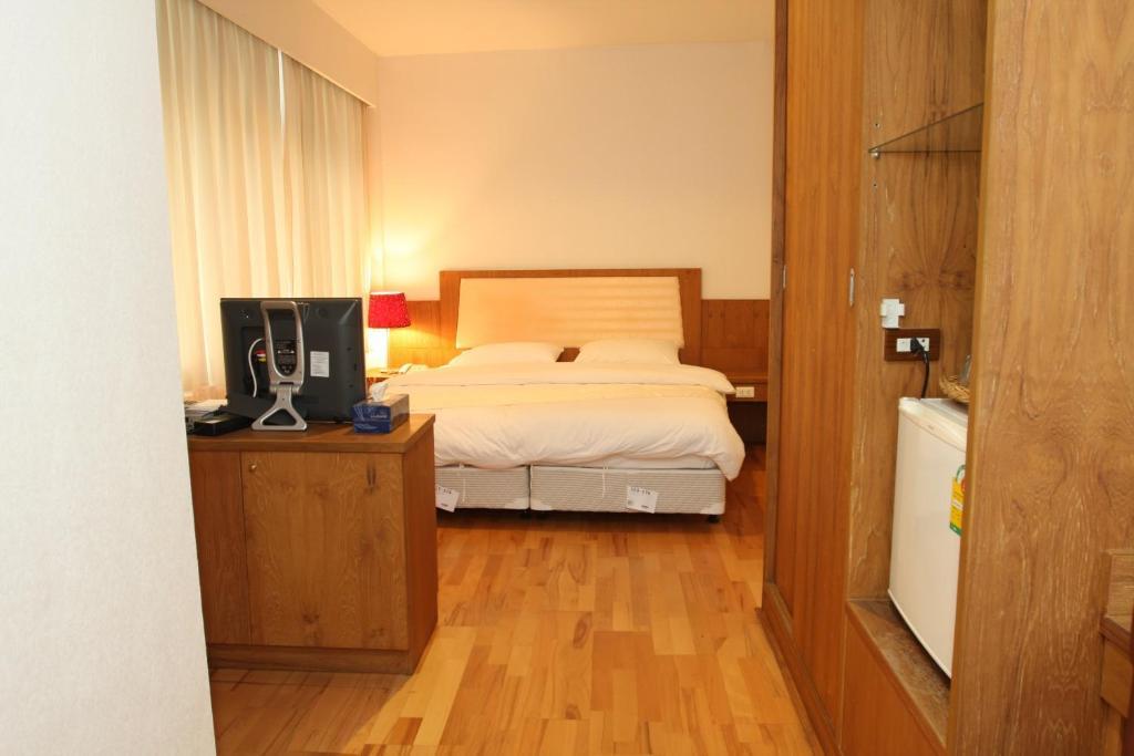 Sun City Hotel Μπανγκόκ Δωμάτιο φωτογραφία