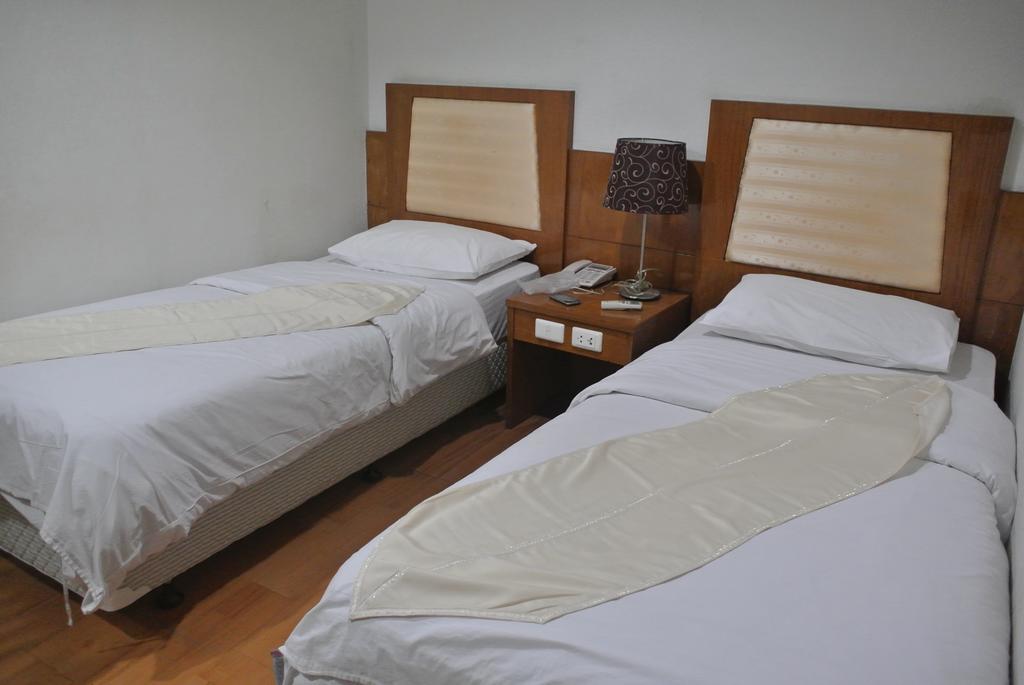 Sun City Hotel Μπανγκόκ Δωμάτιο φωτογραφία