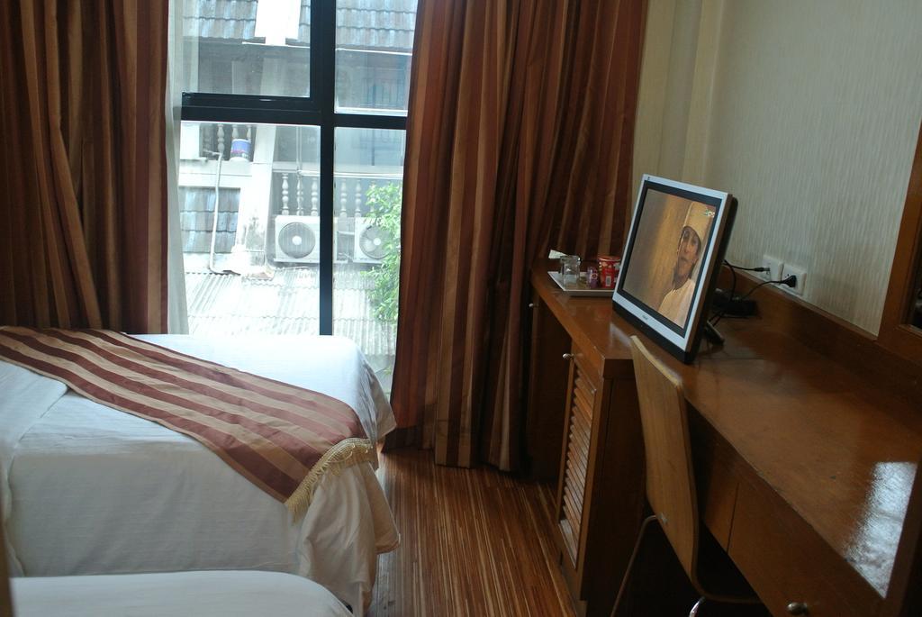 Sun City Hotel Μπανγκόκ Δωμάτιο φωτογραφία